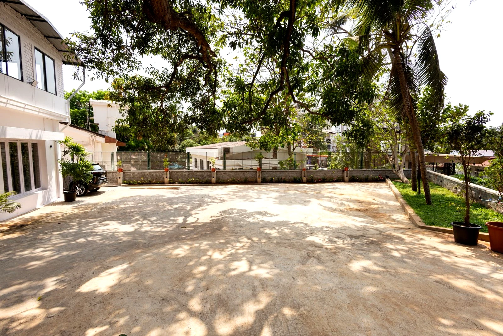 Parking area at Mango Tree Homestay suitable for up to four cars.